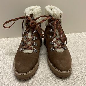 Tan suede, shearling lined hiker boots